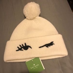 Kate Spade “winking beanie”